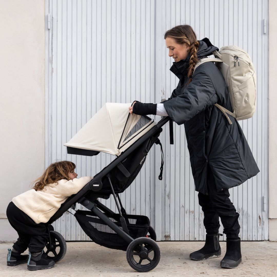 Thule Spring -lastenrattaat + jalkatuki ja tanko