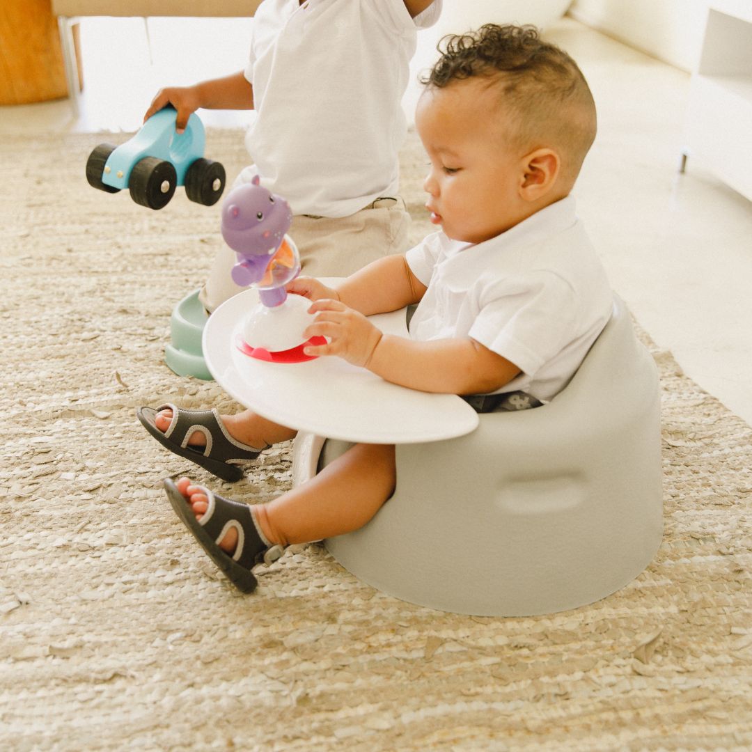 Bumbo babysitter lattiaistuin leikkiä tarjotin