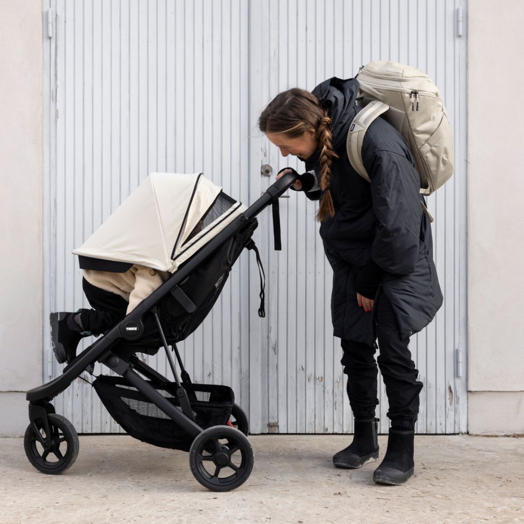 Thule Spring -lastenrattaat + jalkatuki ja tanko